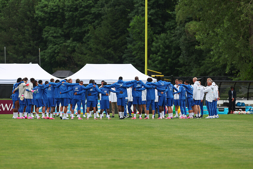 A day with Les Bleus: Recovery, a minute of silence, and a practice match.  
